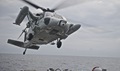 A Republic of Korea navy UH-60 Black Hawk takes off from the flight deck of the guided-missile destroyer USS Decatur. The ROKN helped in an emergency medical evacuation of a U.S. Sailor. (U.S. Navy photo by Mass Communication Specialist 3rd Class Gerald Dudley Reynolds)