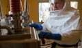 Capt. Shawn Palmer, a biochemist with the 1st Area Medical Laboratory, based out of Aberdeen Proving Ground, Md., and a native of Loma, Colo., breaks down a biological safety level three glove box at the 1st AML’s Ebola testing lab in Zwedru, Liberia, Feb. 9, 2015. The glove box is built to provide maximum personnel and environmental protection from high-risk biological agents. Soldiers of the 1st AML used this equipment to test blood samples of suspected Ebola patients. This, along with other equipment, was decontaminated and packed away as 1st AML closed the Zwedru lab. Operation United Assistance is a Department of Defense operation in Liberia to provide logistics, training and engineering support to U.S. Agency for International Development-led efforts to contain the Ebola virus outbreak in western Africa. (U.S. Army photo by Staff Sgt. Terrance D. Rhodes, Joint Forces Command – United Assistance Public Affairs/RELEASED)