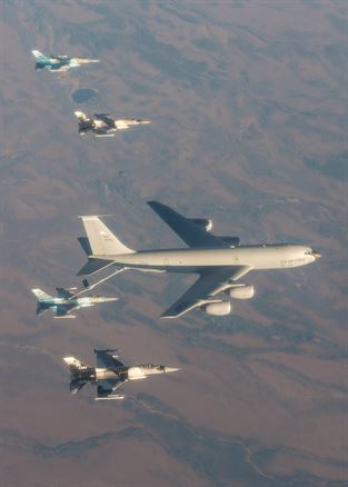 A U.S. Air Force F-16 Fighting Falcon aircraft refuels behind a KC-135 Statotanker deployed from Fairchild Air Force Base, Wash., Oct. 12, 2016 during RED FLAG-Alaska (RF-A) 17-1 at Eielson Air Force Base, Alaska. RF-A simulates the first 10 combat sorties of an initial surge during a conflict, enabling pilots to better understand the stresses of the environment. (U.S. Air Force photo by Staff Sgt. Shawn Nickel)
