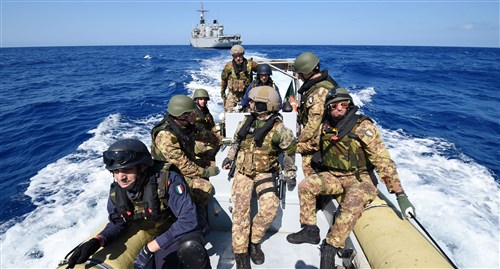 160525-N-XT273-411 MEDITERRANEAN SEA (May 25, 2016) Italian sailors and marines participate in a mock visit, board, search, and seizure boarding drill aboard the Royal Moroccan ship P611 during exercise Phoenix Express 2016, May 25. Phoenix Express is a U.S. Africa Command-sponsored multinational maritime exercise designed to increase maritime safety and security in the Mediterranean. (U.S. Navy photo by Mass Communication Specialist 2nd Class Justin Stumberg/Released)
