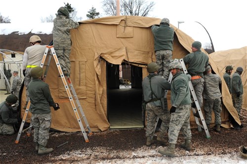 Airmen assemble tents during the Silver Flag training exercise March 5 on Ramstein Air Base, Germany. The purpose of Silver Flag is to prepare Airmen for any type of bare-base deployment. 
