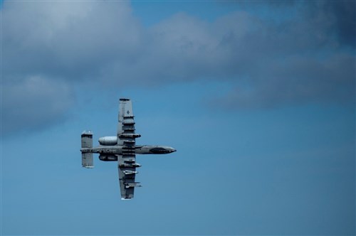 An A-10 Thunderbolt II attack aircraft flies over the airfield at Ämari Air Base, Estonia during Exercise Hedgehog May 7, 2015, . The A-10 supports Air Force missions around the world as part of the U.S. Air Force's current inventory of strike platforms, including the F-15E Strike Eagle and the F-16 Fighting Falcon fighter aircraft. (U.S. Air Force photo by Senior Airman Rusty Frank/Released)