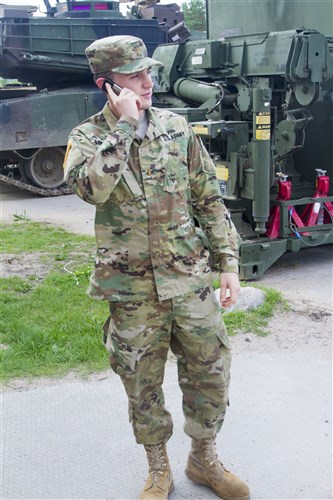 2nd Lt. Craig Longmire, a native of Fairfax Station, VA, a Transportation Officer assigned to 386th Transportation Detachment, 39th Transport Battalion, 16th Sustainment Brigade, 21st Theater Sustainment Command, is talking on the phone with Latvian citizen contractors to coordinate the rail yard shipment at Camp Adazi, Latvia on July 9, 2016. The soldiers of the 386th Transportation Detachment provide movement control for 3rd Battalion, 69th Armored Regiment whose soldiers are training with their Latvian allies in support of Operation Atlantic Resolve which is being conducted in Eastern Europe to demonstrate U.S. commitment to the collective security of NATO and dedication to enduring peace and stability in the region.