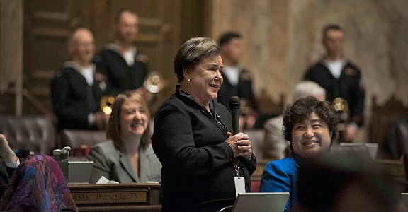 OLYMPIA, Wash. (Feb. 25, 2016) - Washington House Rep. Sherry Appleton, 23rd District-Kitsap, comments on supporting the continuing resolution with the U.S. Navy to the speaker of the House during Olympia Navy Day at the Washington State Legislative Building. The visit was arranged and coordinated through Commander, Navy Region Northwest's annual visit to the Capitol Campus with commanding officers and master chiefs from tenant commands throughout the region to meet with state officials for a continuing resolution with the U.S. Navy. (U.S. Navy photo by Mass Communication Specialist 2nd Class Cory Asato/Released)