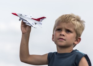 A fan watches the demonstration during the Dayton Airshow, June 21, 2015, at Dayton, Ohio. (U.S. Air Force photo by Senior Airman Rachel Maxwell/Released)