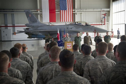 Army Gen. Martin E. Dempsey, the chairman of the Joint Chiefs of Staff, arrived in Warsaw, Poland, July 23, 2013, following a successful trip to Afghanistan. Dempsey met with Polish leaders and American Airmen training with the Polish armed forces July 24.
