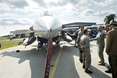 Army Gen. Martin E. Dempsey, the chairman of the Joint Chiefs of Staff, arrived in Warsaw, Poland, July 23, 2013, following a successful trip to Afghanistan. Dempsey met with Polish leaders and American Airmen training with the Polish armed forces July 24.
