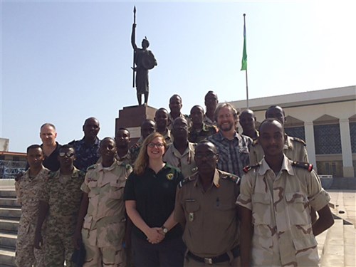 Members of a security assistance training team and the Djiboutian Armed Forces (FAD) pose for a group photo, Dec. 12, 2015 at the People’s Palace in Djibouti. The team conducted a three-week security assistance training session in order to help the FAD combat violent extremist organizations across East Africa. 