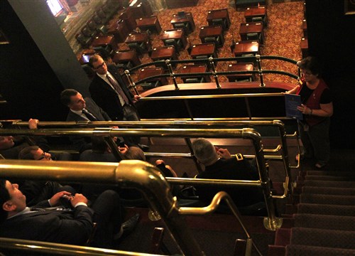 (Far Right) Suzan Kozuch, a tour guide at the Pennsylvania State Capitol in Harrisburg, Pa., discusses the different dynamics of the Pennsylvania Senate Chamber to the Lithuanian dignitaries and Pennsylvania National Guard members during their visit to the Pennsylvania State Capitol on Sept. 15, 2013. The dignitaries represented various parties in the Lithuanian government. 