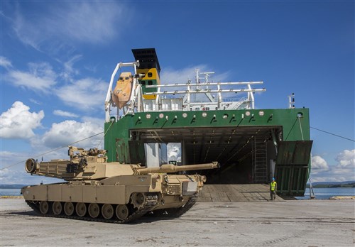 An M1 Abrams tank is staged at a Norwegian port following the conclusion of Exercise Saber Strike 16, July 4, 2016. The tank was used during Exercise Saber Strike 16, and was transported from Riga, Latvia, by a British Roll-On, Roll-Off ship. Once offloaded and staged, it was taken to a Marine Corps Prepositioning Program cave, where it will be meticulously maintained, ensuring it can be pulled and sent to the fight anywhere at any time. (U.S. Marine Corps photo by Sgt. Shawn Valosin/Released)