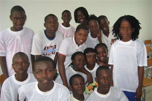 LUANDA, Angola - Children gather in Santa Bakhita Miananga School following the school&#39;s opening ceremony on December 5, 2008 in Luanda, Angola. The two-story school, built in coordination with U.S. Agency for International Development (USAID), includes an expanded toilet system and twice as many classrooms as the previous building. (Photo by Commander Denise Shorey, U.S. Africa Command)