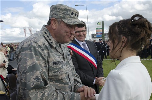 CARENTAN, France--Commander, U.S. European Command Gen. Phil Breedlove talks with members of the local community at an event to honor both the living and fallen veterans of the Normandy D-Day landings at a ceremony here June 4. The event was one of several commemorations of the 70th Anniversary of D-Day operations conducted by Allied forces during World War II June 5-6, 1944. More than 650 U.S. military personnel have joined troops from several NATO nations to participate in ceremonies to honor the events at the invitation of the French government. 