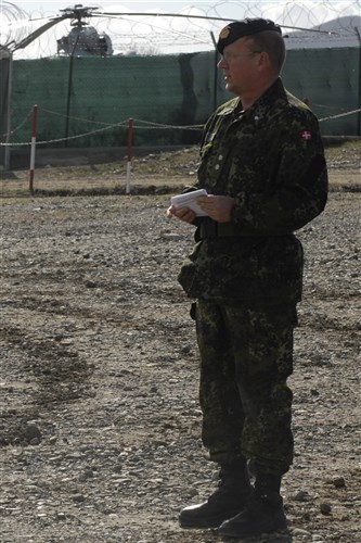 Danish Lt. Col. Jens Nyrup, deputy commander of Multinational Battle Group North, addresses Hungarian, Polish and Slovenian soldiers during a Transfer of Authority ceremony at Camp Nothing Hill, near Leposavic/Leposaviq, Kosovo, Nov. 10. The Polish soldiers, from MNBG East, relinquished responsibilities of Camp Nothing Hill to the Hungarian and Slovenian soldiers, from MNBG West. 