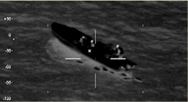 A U.S. Coast Guard HC-144 Ocean Sentry aircraft detects a 25-foot go-fast boat with four individuals and suspicious packages aboard moving at a high rate of speed south of the Dominican Republic Jan. 22 2014.