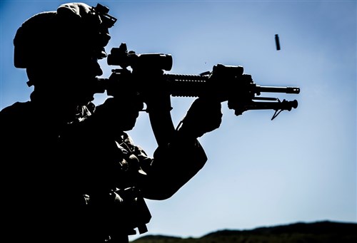 A U.S. Marine with Special-Purpose Marine Air-Ground Task Force Crisis Response-Africa fires his Infantry Automatic Rifle at a training range in Sierra Del Retin, Spain, May 6, 2015. The light weight and rapid-fire capabilities of the IAR allows the Marines to suppress enemy positions while maintaining a high level of maneuverability. (U.S. Marine Corps photo by Sgt. Paul Peterson/Released)