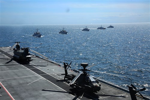 The United Kingdom’s Royal Navy’s flagship, the HMS Ocean, positioned herself alongside other ships during the photo exercise showcasing the amphibious assets for BALTOPS 2015, June 8, 2015.  The exercise is an annually recurring multinational exercise designed to enhance flexibility and interoperability, as well as demonstrate resolve of allied and partner forces to defend the Baltic region (U.S. Marine Corps photo by 1st Lt. Sarah E. Burns)
