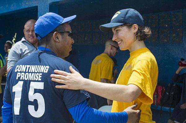 Ship's Serviceman Seaman Nina Anton, from Rockville, Md., assigned to Naval Medical Center Portsmouth, Va., speaks with a Panamanian citizen after a softball game during a community service event in support of Continuing Promise 2015. Continuing Promise is a U.S. Southern Command-sponsored and U.S. Naval Forces Southern Command/U.S. 4th Fleet-conducted deployment to conduct civil-military operations including humanitarian-civil assistance, subject matter expert exchanges, medical, dental, veterinary and engineering support and disaster response to partner nations and to show U.S. support and commitment to Central and South America and the Caribbean.  U.S. Navy photo by Mass Communication Specialist 2nd Class Brittney Cannady (Released)  150531-N-YM856-718