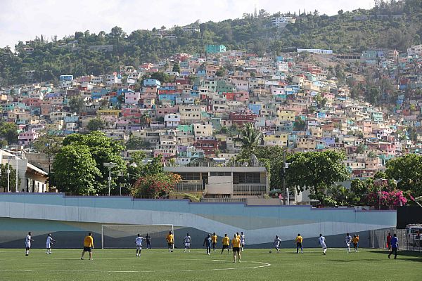 Sailors assigned to the Military Sealift Command hospital ship USNS Comfort (T-AH 20) play soccer during a community relations event at Park Sainte Therese soccer field in support of Continuing Promise 2015. Continuing Promise is a U.S. Southern Command-sponsored and U.S. Naval Forces Southern Command/U.S. 4th Fleet-conducted deployment to conduct civil-military operations including humanitarian-civil assistance, subject matter expert exchanges, medical, dental, veterinary and engineering support and disaster response to partner nations and to show U.S. support and commitment to Central and South America and the Caribbean.  U.S. Army photo by Spc. Lance Hartung (Released)  150915-A-BK746-217