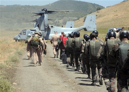SIERRA DEL RETIN, Spain (June 23, 2011) - Spanish marines along with Marines from the 22nd Marine Expeditionary Unit (MEU) prepare to load into an MV-22B Osprey from Marine Medium Tiltrotor Squadron (VMM) 263 (Reinforced) to conduct parachute operations into a Spanish military training area northwest of Naval Station Rota, Spain, June 23, as part of the bilateral Spanish Amphibious Landing Exercise (PHIBLEX) 2011. The Bataan Amphibious Ready Group, which includes multipurpose amphibious assault ship USS Bataan (LHD 5), dock landing ship USS Whidbey Island (LSD 41) and the amphibious transport dock USS Mesa Verde (LPD 19) are also participating in the exercise. 
