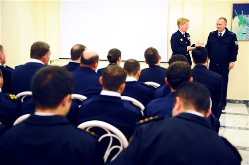 SOUDA BAY, Greece - Commander, U.S. Naval
Forces Europe-Africa Fleet Master Chief JoAnn Ortloff, left, speaks with Ukrainian Master Chief Petty Officer of the Navy Riabtsev Serhii, right, during the kick-off reception for Eurasia Partnership Capstone 2012 (EPC 12). Annually hosted by the U.S. Navy, EPC aims to increase maritime safety and security through workshops and seminars. Nations participating in EPC include Azerbaijan, Bulgaria, Georgia, Greece, Romania, Ukraine and the United States. 