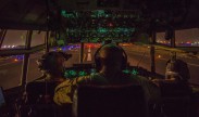 Pilots from the Alaska Air National Guard's 144th Airlift Squadron prepare to take off in a C-130 Hercules at an undisclosed location in Southwest Asia, June 17, 2016. The transport mission was one of the last combat missions during the 144th AS's final C-130 deployment. (U.S. Air Force photo/Staff Sgt. Douglas Ellis)