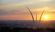 Photo: The sun rises behind the Air Force Memorial, the Pentagon, and the Washington, D.C. , skyline in Arlington, Va., Aug. 25, 2013. Since its formal dedication Oct. 14, 2006, the memorial has been a place of pride and honor for all the men and women who served and continue to serve the Air Force and its heritage organizations. (U.S. Air Force photo/Tech. Sgt. Peter R. Miller)