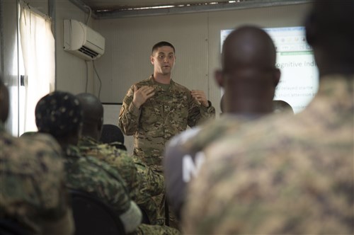 U.S. Army Staff Sgt. Matthew Glaberman, Charlie Company, 411th Civil Affairs Battalion operations sergeant, talks about the effects combat stress can have on a person in a deployed environment, and how to recognize and treat it during a mental health sharing of best practices Oct. 10, 2016, in Mogadishu, Somalia. More than 40 members of the Uganda People’s Defense Force attended the class to learn about combat stress while they are deployed in support of the African Union Mission to Somalia. (U.S. Air Force photo by Staff Sgt. Eric Summers Jr./Released)