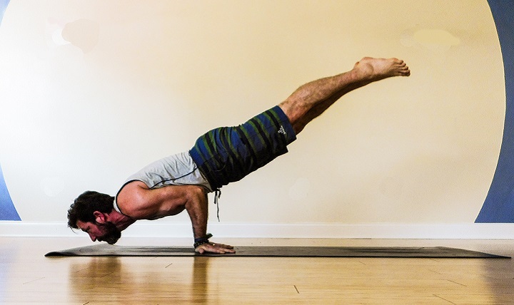 Retired Air Force Master Sgt. Chris Eder practices yoga, which he says helps with posttraumatic stress disorder 