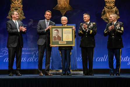 Secretary of Defense Ashton Carter, Secretary of the Army Eric Fanning, Vice Chief of Staff Gen. Daniel Allyn and Sgt. Maj. of the Army Daniel Dailey present a framed Medal of Honor citation to retired Lt. Col. Charles Kettles during the Hall of Heroes Induction Ceremony at the Pentagon, in Arlington, Va., July 19, 2016, for actions during a battle near Duc Pho, South Vietnam, May 15, 1967.