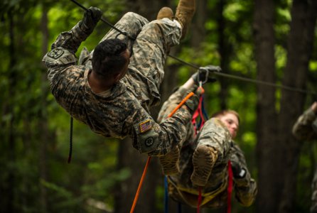 Cadets in Cadet Basic Training at Fort Knox, Ky., attempt to evacuate a simulated casualty across an obstacle at the Leaders Reaction Course, July 23.