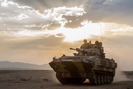 A BMP-1 from Hawg Troop, 2nd Squadron, 11th Armored Cavalry Regiment, rolls across the barren desert to intercept the 1st Armored Brigade Combat Team, 1st Infantry Division, in the John Wayne Foothills of the National Training Center, July 31, 2016. The purpose of this exercise was to test the Devil Brigades' abilities in a mounted combat scenario in a simulated real-time environment.