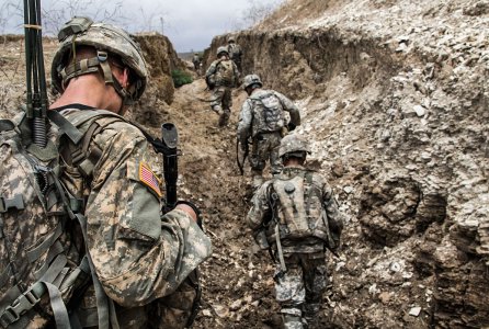 Infantrymen with Bravo Company, 1st Battalion, 30th Infantry Regiment, 2nd Infantry Brigade Combat Team, 3rd Infantry Division move through a trench during a company-level combined arms live-fire exercise, July 25, 2016 in Thies, Senegal as part of Africa Readiness Training 16. ART16 is a U.S. Army Africa exercise designed to increase U.S. and Senegalese readiness and partnership through combined infantry training and live-fire events.