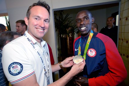 Secretary of the Army Eric Fanning holds the silver medal won by Spc. Paul Chelimo of the U.S. Army World Class Athlete Program, Aug. 21, 2016, at the USA House in Rio de Janerio.