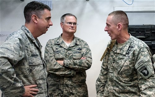141018-Z-VT419-205: U.S. Army Maj. Gen. Gary J. Volesky (right), commanding general of the 101st Airborne Division, speaks with Lt. Col. Bruce Bancroft (left) and Col. David Mounkes of the Kentucky Air National Guard’s 123rd Contingency Response Group Oct. 18, 2014, during a tour of the Joint Operations Center for Joint Task Force-Port Opening Senegal at Léopold Sédar Senghor International Airport in Dakar, Senegal. The JTF-PO is funneling humanitarian supplies and military support into West Africa as part of Operation United Assistance, the international effort to fight Ebola. Volesky will serve as the new commander of the U.S. military’s Operation United Assistance Joint Forces Command, headquartered in Liberia, where the Army is sending 3,000 Soldiers to support the USAID-led, whole-of-government effort to respond to the Ebola outbreak in West Africa. (U.S. Air National Guard photo by Maj. Dale Greer/Released)