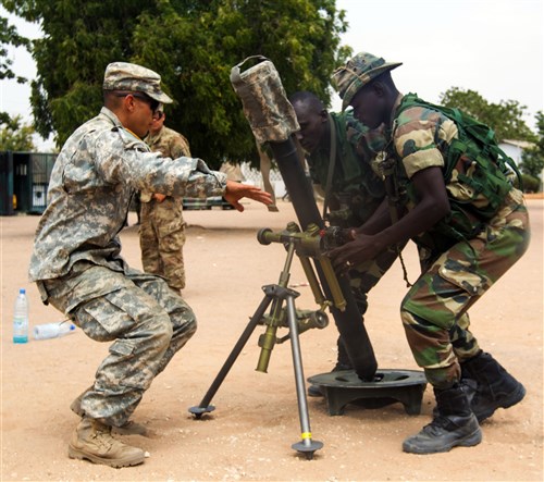 U.S. Army Soldiers assigned to 1st Battalion, 30th Infantry Regiment, 2nd Inf. Brigade Combat Team, 3rd Inf. Division and the Senegalese Army's 1st Paratrooper Battalion rehearse mortar crew drills July 12,  in Thies, Senegal as part of Africa Readiness Training 2016. ART 2016 is a U.S. Army Africa exercise designed to increase U.S. and Senegalese readiness and partnership through combined infantry training and live fire events. (U.S. Army Africa photo by Spc. Craig Philbrick/Released)