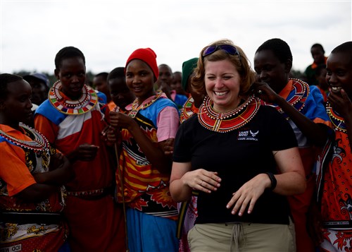 U.S. Air Force Senior Airman Carmen Emborski, U.S. Air Forces in Europe and Air Forces Africa band vocalist performs during a medical outreach event June 22, 2016 at Lokusero, Kenya. The band performed during a three-day medical outreach as part of the first African Partnership Flight in Kenya. The APF is designed for U.S. and African partner nations to work together in a learning environment to help build expertise and professional knowledge and skills. (U.S. Air Force photo by Tech. Sgt. Evelyn Chavez/Released)