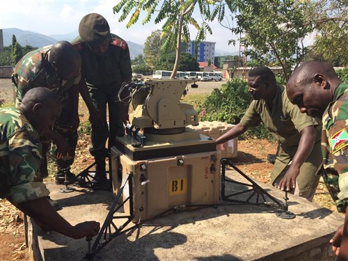 Burundian National Defense Force Soldiers work together to install their African Data Sharing Network terminal. Combined Joint Task Force–Horn of Africa communications Soldiers led a sharing of best practices for installing, operating, and maintaining their satellite terminal, June 8 – 17, 2016. The ADSN communication package provides a dynamic intelligence sharing platform for the African Union Mission in Somalia’s troop contributing countries. (U.S. Army photo by 1st Lt. Justin R. Klatt/Released)