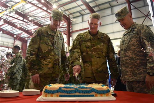 From left to right: U.S. Army Gen. David M. Rodriguez, U.S. Africa Command commanding general, Brig. Gen. Kurt Sonntag, new Combined Joint Task Force-Horn of Africa commanding general, and Maj. General Mark Stammer, departing CJTF-HOA commanding general, cut a cake during a change of command ceremony post-reception April 13, 2016, at Camp Lemonnier, Djibouti. Service members, diplomats and multi-national guests attended the ceremony and met the new commander. (U.S. Air Force photo by Staff Sgt. Kate Thornton/Released) 