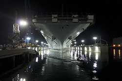 The amphibious assault ship USS Essex (LHD 2) enters the dry-dock at the National Steel and Shipbuilding Company. The ship is undergoing an 18-month maintenance and upgrade period and expects to return to the fleet in 2014. (U.S. Navy photo by Senior Chief Mass Communication Specialist Joe Kane/Released) 