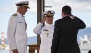 Adm. Harry B. Harris Jr. salutes Defense Secretary Ashton B. Carter as he assumes command of U.S. Pacific Command (USPACOM) during the joint USPACOM and U.S. Pacific Fleet (PACFLT) change of command ceremony at Joint Base Pearl Harbor-Hickam. During the dual ceremony, Adm. Scott H. Swift relieved Harris as the PACFLT commander and Harris assumed command of USPACOM from Adm. Samuel J. Locklear III. U.S. Navy photo by Mass Communication Specialist 2nd Class Johans Chavarro
