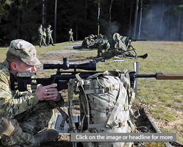 Staff Sgt. Floyd Smith, Headquarters and Headquarters Company, 2nd Battalion, 503rd Infantry Regiment, 173rd Airborne Brigade, fires his sniper rifle during Sniperfest, a multi-national sniper competition held here. 