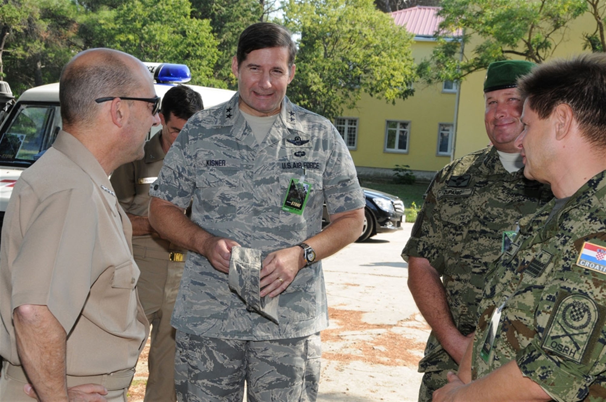 ZADAR, Croatia &mdash; Navy Adm. James G. Stavridis, U.S. European Command commander, speaks with Maj. Gen. Frank Kisner, Col. Nikola Zupanic and Brig. Gen. Drazen Scuri after arriving at Zemunik Air Base here Sept. 23, 2009. The EUCOM commander came here to visit the site of the special operations exercise, Jackal Stone. The international special operations exercise, co-organized by the Special Operations Battalion of General Staff of the Croatian Armed Forces and U.S. Special Operations Command Europe, is being conducted to enhance the capabilities and interoperability of the soldiers participating. (Department of Defense photo by Maj. Jim Gregory)