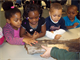 Preschoolers at Riverbend Headstarts are investigating rotting logs with Park Rangers from the National Great Rivers Museum to discover the amazing habitats supported by dead or dying trees.