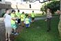 U.S. Army Corps of Engineers&#39; Park Ranger Samantha Vazquez explains to Earth Day volunteers the process of placing name placards on tree trunks in Fort DeRussy Park area near the Corps&#39;  Pacific Regional Visitor Center. More than 50 volunteers from the U.S. Army Corps of Engineers partnered with local JROTC students and others to clean up Waikiki Beach April 2 as part of Earth Month 2016.  