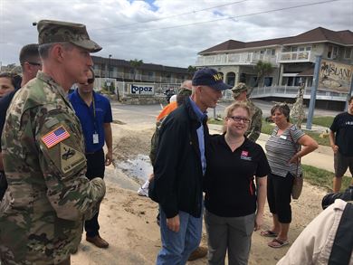 Florida Governor Rick Scott and District Commander Col. Jason Kirk greet Jacksonville District employee Jennifer Coor while on a tour of locations affected by Hurricane Matthew.