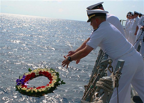 OFF THE COAST OF BEIRUT &mdash; With the crew in formation on the flight deck, Cmdr. Carl W. Meuser, commanding officer of USS Higgins (DDG 76), and Master Chief Bobby Maddox, command master chief onboard Higgins, lay a wreath in the sea twenty-six nautical miles off the shores of Beirut in honor of those killed in the barracks bombing Oct. 23, 1983. Higgins, an Arleigh Burke-class destroyer, is homeported out of San Diego, Calif. and is currently operating in the 6th Fleet area of operations and is participating in the U.S.-Israeli bilateral exercise Juniper Cobra 10 (JC 10). JC 10, held every two years, is the fifth iteration of its kind and is designed to test
the active missile-defense capabilities of both armed forces. (U.S. Navy photo by Mass Communication Specialist 2nd Class David Holmes)