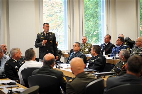 Command Sgt. Maj. Metaj Cenc, command senior enlisted leader of the Kosovo Security Forces, addresses an assembled group of senior enlisted leaders, from more than 30 nations, at the opening of the 10th annual International Senior Enlisted Seminar, Sept. 9, 2013. ISES participants focus on building the capabilities and interoperability of noncommissioned officers, while continuing to develop the NCO corps of NATO, Partnership for Peace, and key-contact nations. 