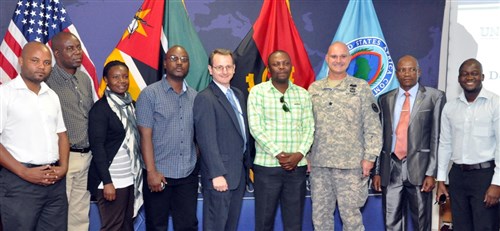 A delegation from Mozambique, consisting of journalists and media representatives from various media outlets, poses for a group photo during a visit to U.S. Africa Command as part of the AFRICOM Media Visit Program hosted by the AFRICOM public affairs office in Stuttgart, Germany, July 21, 2014.