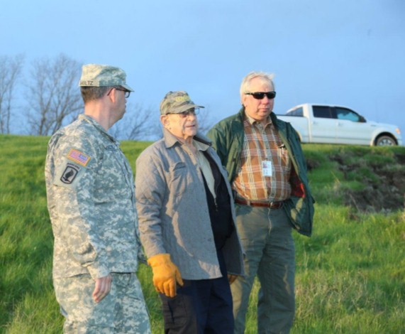 Corps employees with levee board member