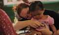 Royal Australian Air Force Cpl. Mia Woolley, medical technician, conducts a medical screening on Trica, a 1-year-old from Lila, Bohol province, Philippines, during the Health Services Outreach provided as part of the Pacific Angel Philippines mission. Efforts help multilateral militaries in the Pacific improve and build relationships across a wide spectrum of civic operations, which bolsters each nation’s capacity to respond and support future humanitarian assistance and disaster relief operations. (U.S. Air Force photo by Tech. Sgt. Aaron Oelrich)